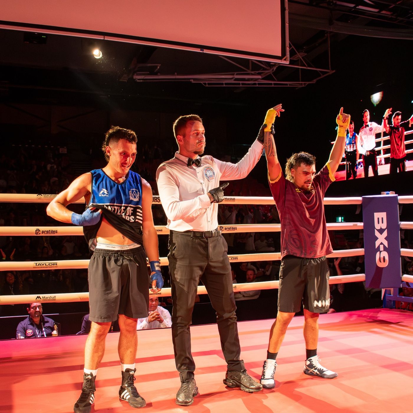 Winner's arm raised at BOTC2